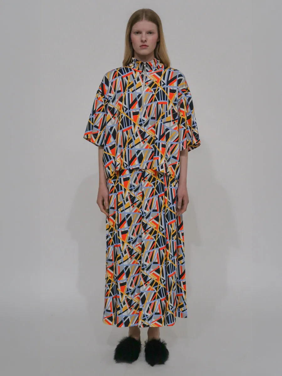 ZIP-UP OVERSIZED POLO TOP - ABSTRACT